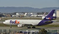 N377FE @ KLAX - Taxiing at LAX - by Todd Royer