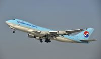 HL7602 @ KLAX - Departing LAX - by Todd Royer