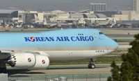 HL7609 @ KLAX - Taxiing to parking at LAX - by Todd Royer