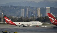 VH-OEJ @ KLAX - Getting at tow at LAX - by Todd Royer