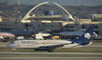 XA-ZAM @ KLAX - Taxiing to gate at LAX - by Todd Royer