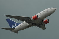 OY-KKS @ ESSA - Scandinavian Airlines Boeing 737-600 taking off from Stockholm Arlanda airport, Sweden.