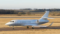 VP-CAM @ EGPH - Delta Technical Services Falcon 2000 taxiing to runway 06 - by Mike stanners