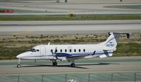 N27NG @ KLAX - Taxiing for departure - by Todd Royer