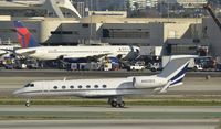 N900ES @ KLAX - Departing LAX - by Todd Royer