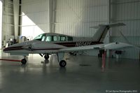 N6042F @ KAPF - Taken inside one of the hangars at Naples Municipal. - by Carl Byrne (Mervbhx)