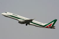 EI-RNC @ LSGG - Alitalia Cityliner - by Chris Hall
