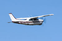 N702TC @ KAWO - 1976 Cessna T210M C/N 21061672 - by Terry Green