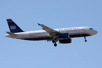 N622AW @ DFW - Landing at DFW Airport - by Zane Adams