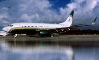 N737WH @ KSUA - Miami Dolphins tail. Originally from Kodachrome slide.