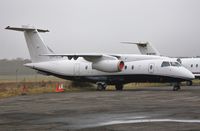VP-CJD @ EGHH - Parked on JETS apron - by John Coates