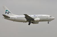 SX-BHR @ EGHH - About to land on 08 - by John Coates