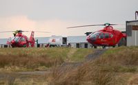 G-WASC @ EGFH - Mid-Wales Air Ambulance helicopter (Helimed 59) taking on fuel at Swansea Airport. - by Roger Winser