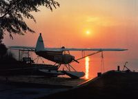 N4471A - Picture taken by original owner, on the shore of Lake St. Clair, at Gaukler Point, in Michigan. - by Harry Garland