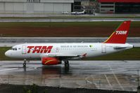 PT-MZA @ SBSP - TAM A319 on a rainy day - by FerryPNL