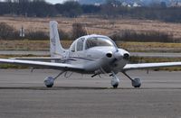 G-OPSS @ EGFH - Visiting SR-20 taxying for departure. - by Roger Winser