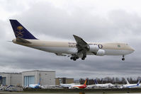 HZ-A13 @ KPAE - Seen arriving at KPAE was this 747-8F destined for Saudi Cargo, using temporary flight test registration. - by Joe G. Walker