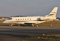 N543WW @ EGHH - Parked in the evening sun at Sigs. - by John Coates