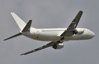 N245SY @ EGHH - Departing after respray white for Al Sayegh Group - by John Coates