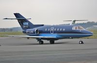 OY-LKG @ EGHH - Parked at Sigs - by John Coates