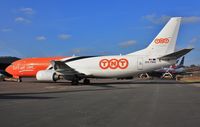 OO-TNQ @ EGHH - Being pushed back after service - by John Coates