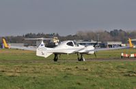 G-XDEA @ EGHH - Pointing into the wind whilst waiting to depart - by John Coates