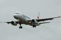 EC-IZK @ ESSA - Airbus A320 of Spanair approaching Stockholm Arlanda airport, Sweden. - by Henk van Capelle
