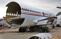 EI-EEW @ EGHH - Nears the end...but will the front fuselage have a future? - by John Coates