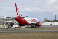 N7812G @ KPAE - Still in Air Berlin colors, this 737-76N has been acquired by Southwest Airlines. Aircraft seen on the tarmac at KPAE awaiting cabin conversion and repaint. - by Joe G. Walker