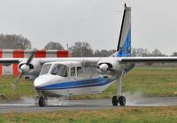 G-HEBO @ EGHH - Arriving after heavy rain - by John Coates