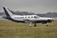 F-GTJM @ EGHH - Taviing to depart after a short visit - by John Coates