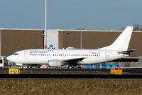YU-ANL @ EHAM - JAT Airways Boeing 737-300 taxying at Amsterdam Schiphol airport, the Netherlands. The three dots on its tail are missing. - by Henk van Capelle
