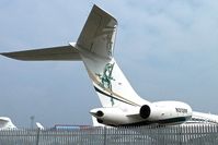 N313RF @ EGGW - Unusual Tail art on 2006 Bombardier BD-700-1A10, c/n: 9194 at Luton - by Terry Fletcher