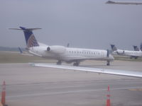 N14158 @ IAH - erj-145xr taxing to runway 15L