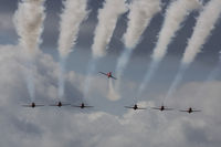 XX227 @ EGHH - For 2012 after a tragic 2011, the Red Arrows flew seven aircraft at displays. Here they are breaking for landing. - by Howard J Curtis