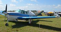 N7918D @ LAL - 1957 BEECH H35 BONANZA AT SUN N FUN - by dennisheal