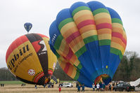 G-PSAX - At the 2013 Icicle Balloon Meet, Savernake Forest, Wilts. G-OUMC almost inflated behind and G-SNOW already airborne. - by Howard J Curtis