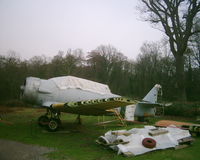 KF388 @ EGHH - Bournemouth Aviation Museum's Harvard under restoration. - by Howard J Curtis
