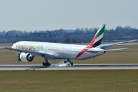 A6-EGT @ EDDL - EK B773 smoking - by FerryPNL