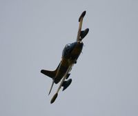 G-UVNR @ EGFH - The pattern is clear. Resident Stikemaster fast and low past the tower. - by Roger Winser