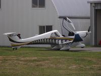 ZK-PSA @ NZAR - Owner giving a push start! - by magnaman