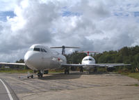 G-AVMT @ EGHH - With sister ship G-AWYT to the left. - by Howard J Curtis