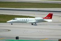 N327AR @ FLL - Taken from the Hibiscus car park viewing area. - by Carl Byrne (Mervbhx)