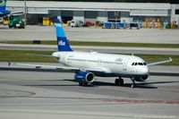 N524JB @ FLL - Taken from the Hibiscus car park viewing area. - by Carl Byrne (Mervbhx)