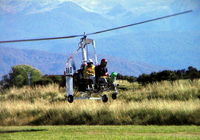 ZK-RAO @ NZTZ - Colin Wood learning to fly his Parsons Tandem gyrocopter, with instructor Bill Black in rear seat. - by J Wood