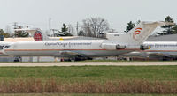 N815EA @ KILN - A Capital Cargo Boeing 727 and a stablemate await their turn to wear the airline's new livery. - by Daniel L. Berek