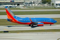 N929WN @ FLL - Taken from the Hibiscus car park viewing area. - by Carl Byrne (Mervbhx)