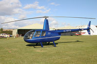 G-TBTB @ X5FB - Robinson R44 Raven at Fishburn Airfield, October 2012. - by Malcolm Clarke