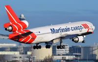PH-MCP @ EHAM - Martinair MD11F landing in AMS - by FerryPNL