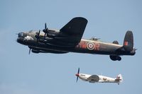 PA474 @ EGHR - Lancaster joined by Spitfire(MK356 cn CBAF.IX.1561) and Hurricane (not in pic), together the Battle of Britain Memorial Flight. Display at Goodwood 2009. - by FerryPNL